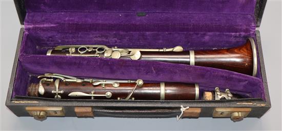 A rosewood clarinet by M. Barr, Victoria St, London, nickel-mounted, cased (mouthpiece a.f.)